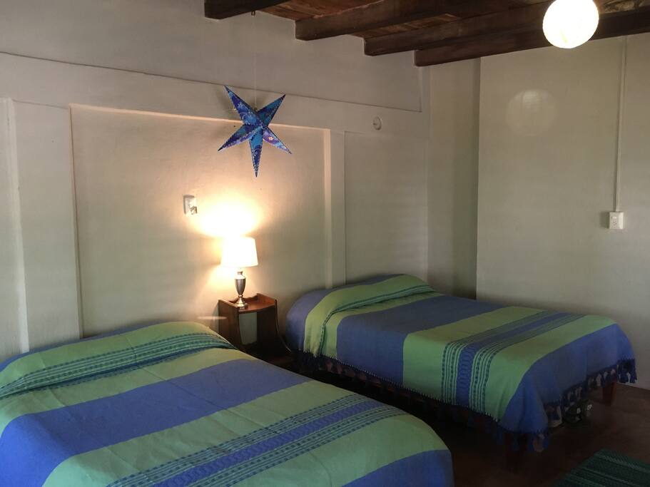 Room #2 has two Full beds nicely appointed