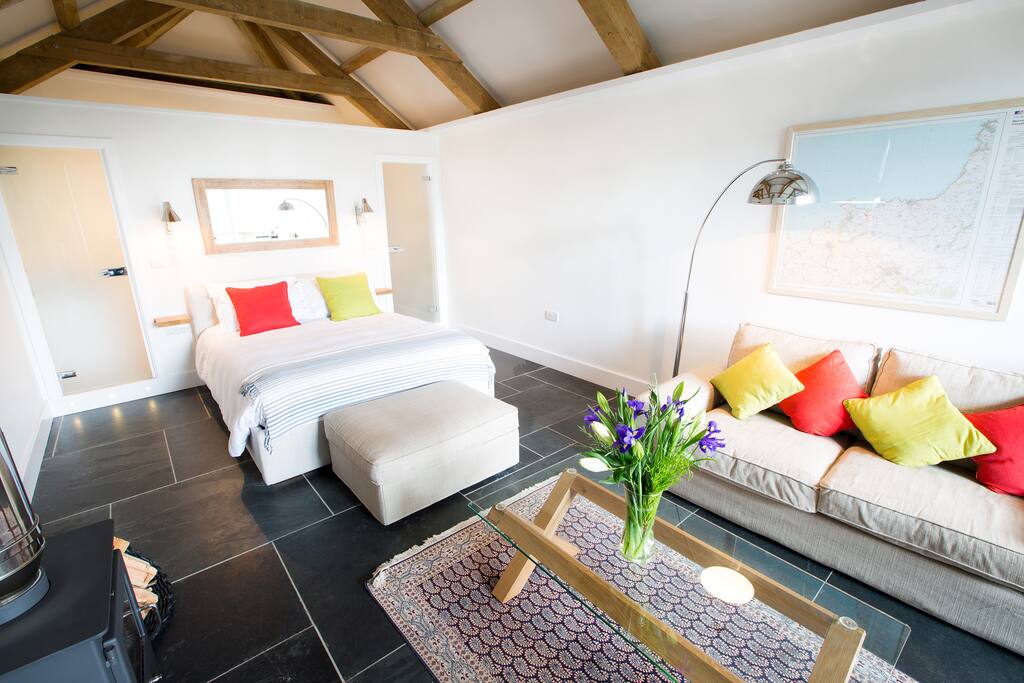 Bedroom and Sofa Area with Woodburner and En-Suite at the Back