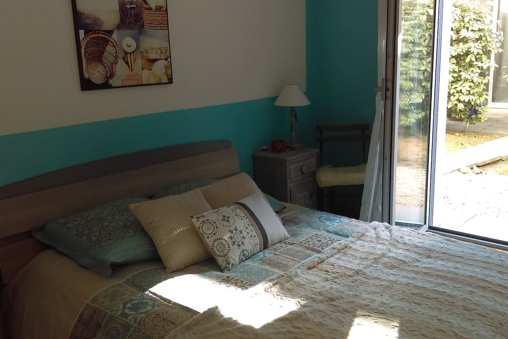 Chambre avec accès à la terrasse