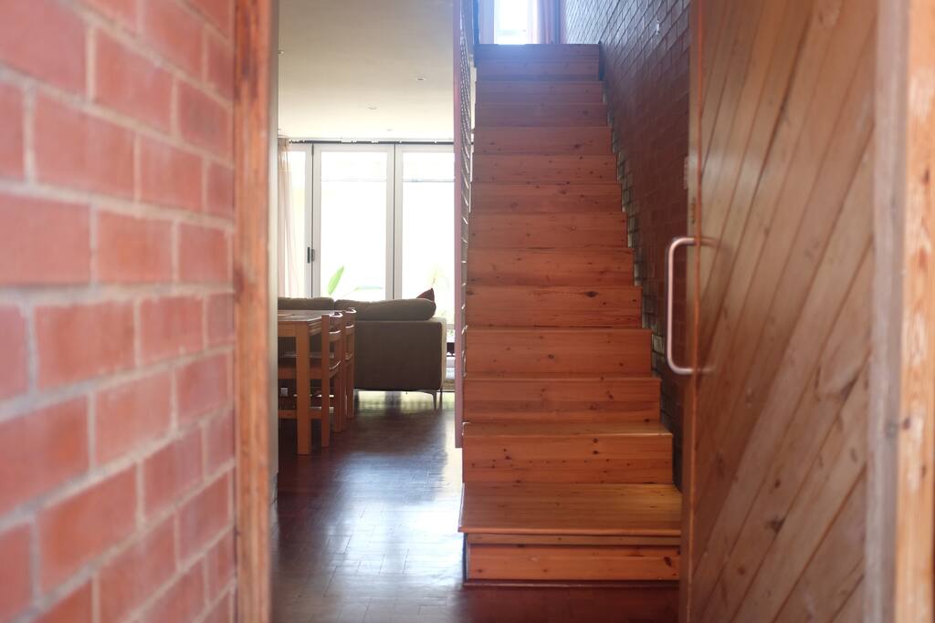 Staircase leading up to room levels