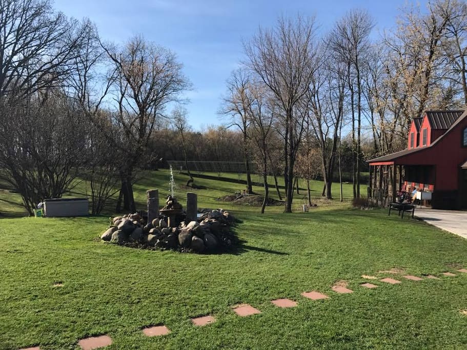 Here you just have a glimpse of our fountain/waterfall feature to the east of the cottage. All the land you see here is ours and is available for your use.