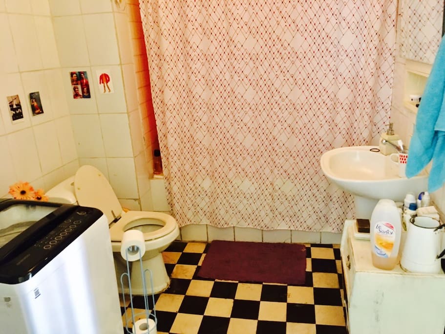 Bathroom with laundry machine