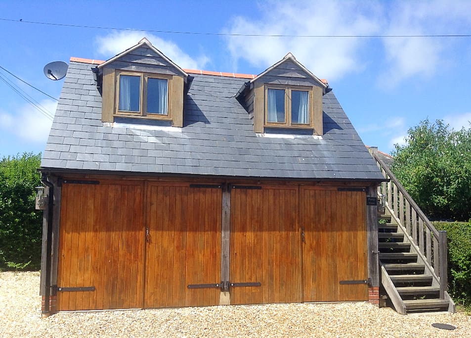 Pump View sits on the top floor of this cosy cabin, which is nestled in the Dorset countryside.