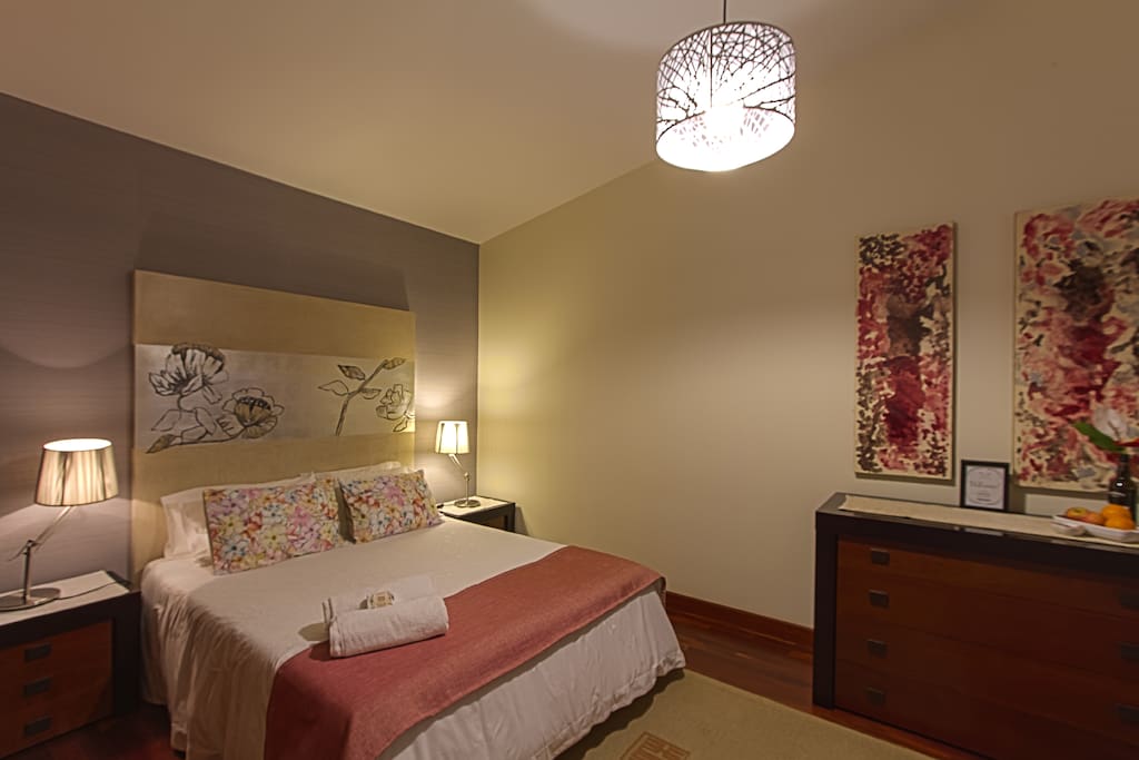 Your comfy room with a double bed.