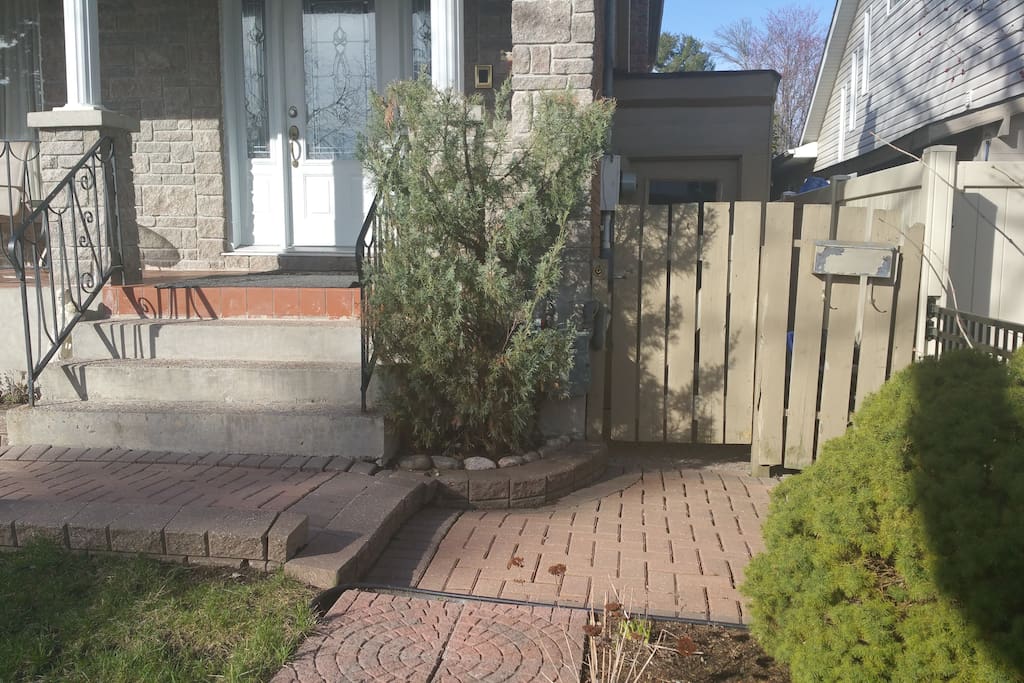 Apartment Entrance: Private Gate followed by a separate entrance to the apartment (Beige Door)