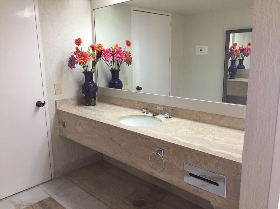 Full size vanity/ mirror in the bathroom to make preparing fpr the day/ night easier!