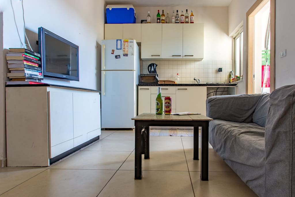 This is our kitchen.
And mini living room, you can chill here when its too warm on the roof