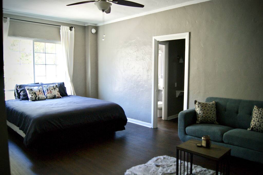 Bed and love seat with a petite coffee table