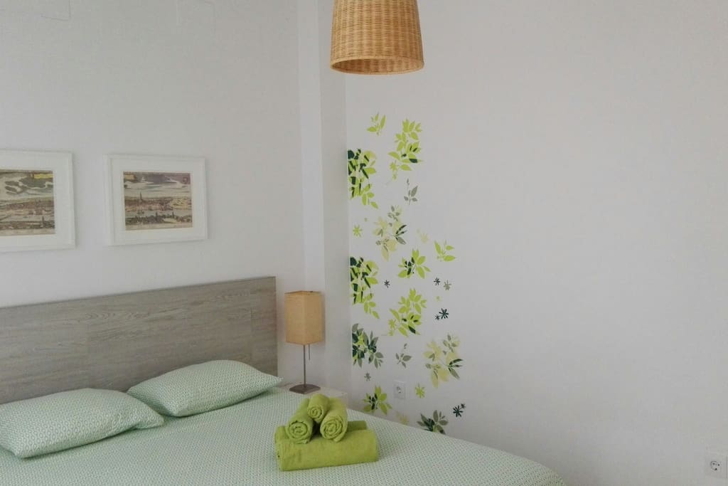 Sneak preview of emprovements (more photos to come!) Bright bedroom with new matrass and large closet.