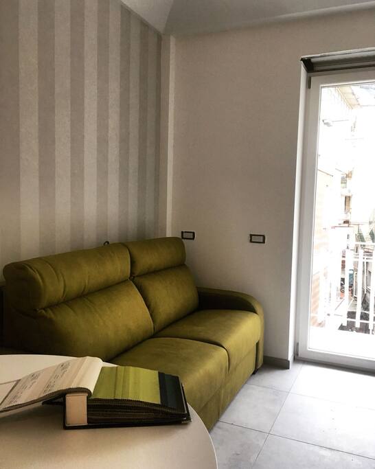 angolo soggiorno con divano letto