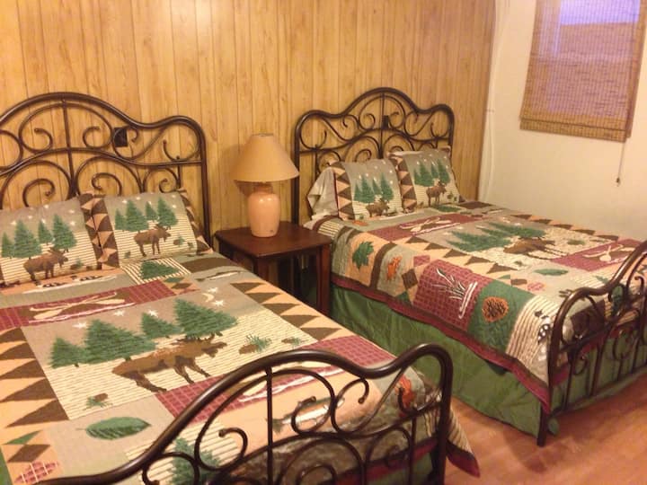 Dos camas queen size.