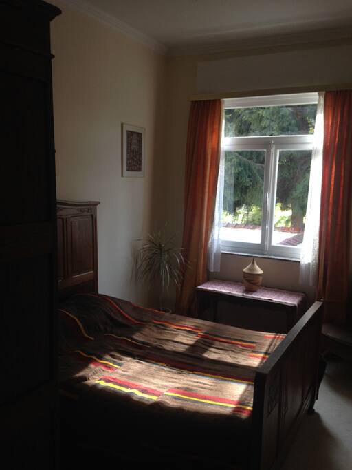 Chambre avec vue sur le jardin