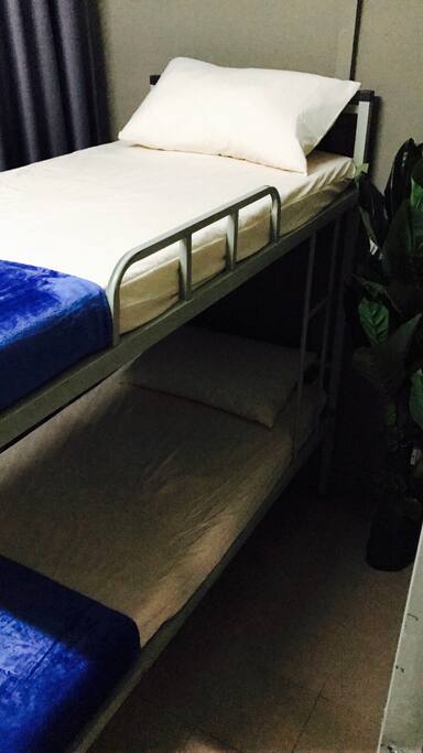 Comfortable bunk beds complete with pillow & blanket.