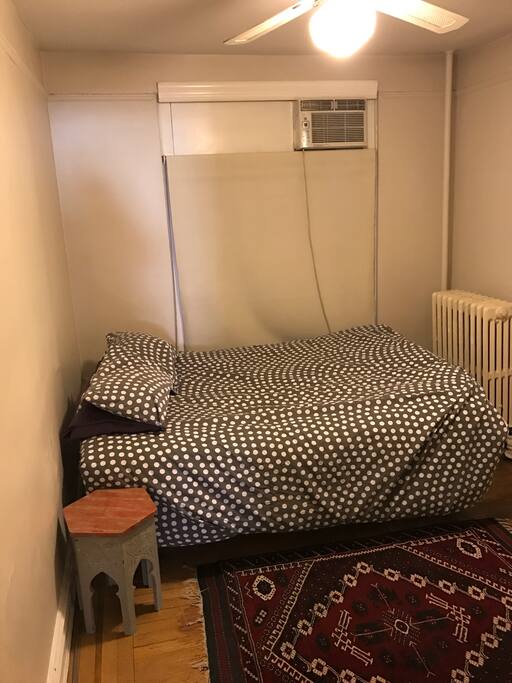 Bedroom in the back with a full size bed which sleeps 2 people.