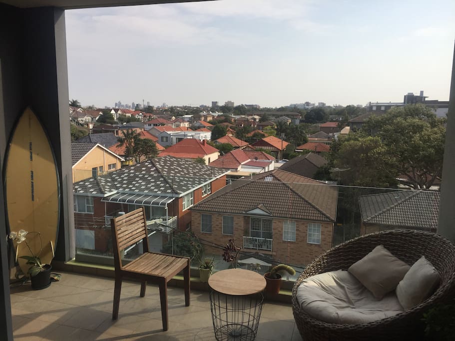 Main shared balcony off of lounge room. Great view of city!