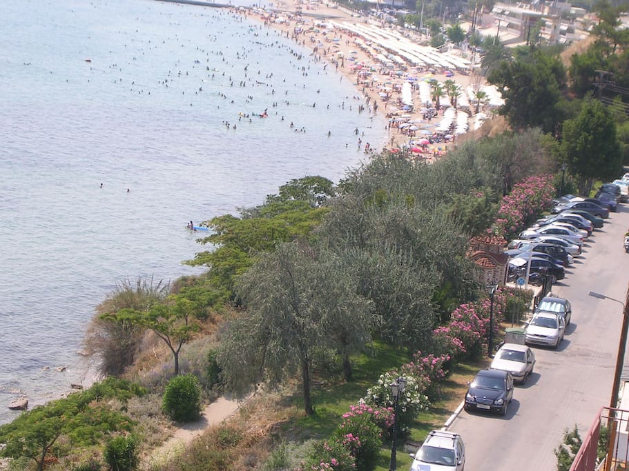 Our street in front of our property. View from the street or top level apartments. You see the main beach plaza.