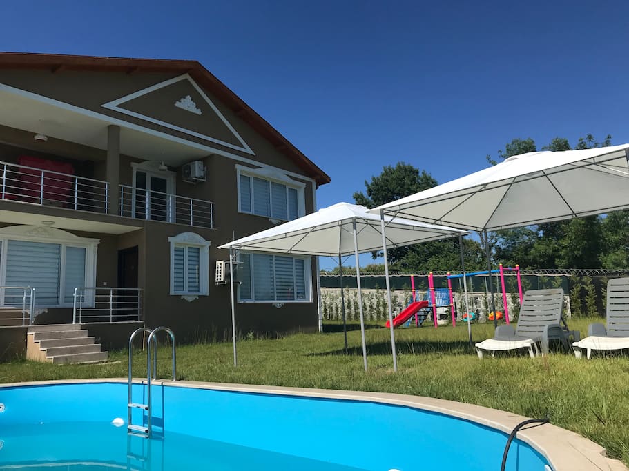 Pool garden playground and italian design villa