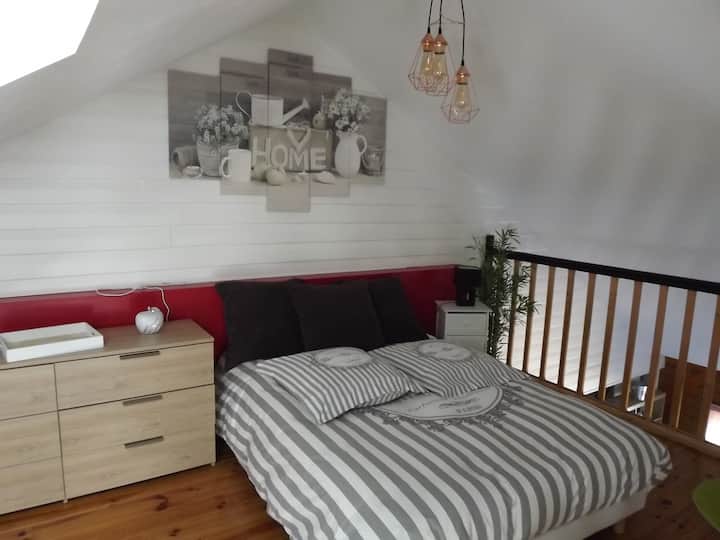 de slaapkamer op de tussenverdieping.