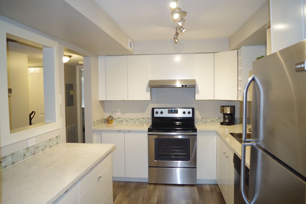 Quartz counters, full sized appliances, plenty of storage and preparation area