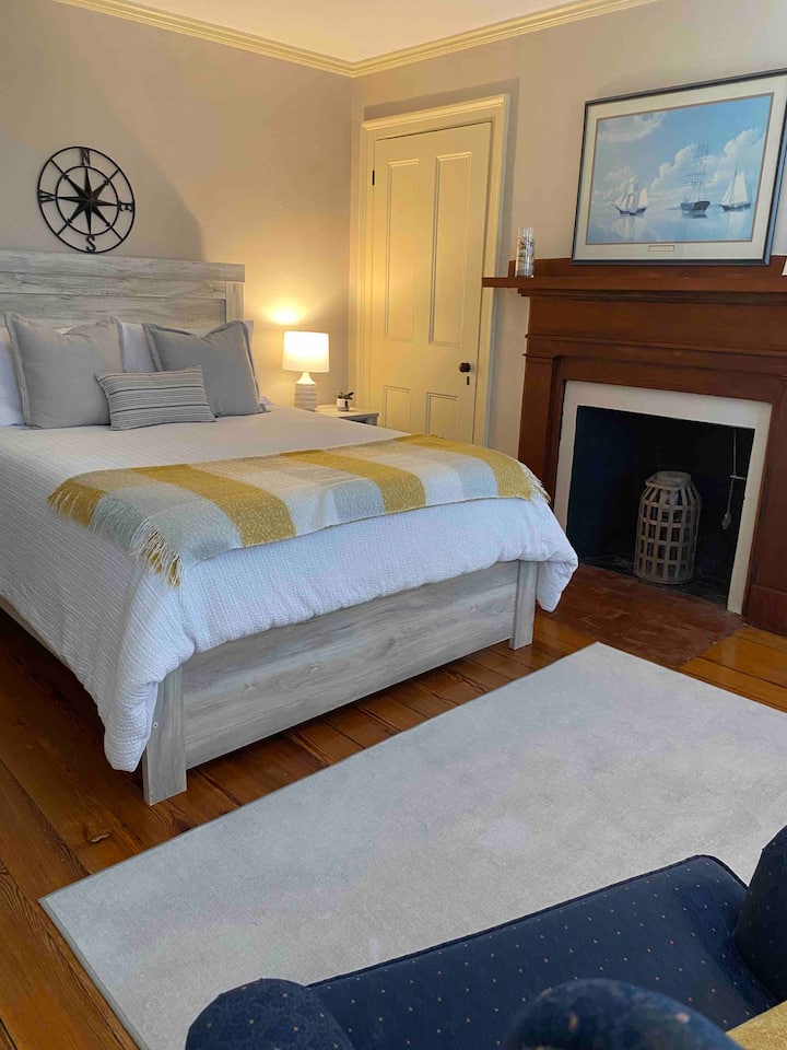 There is a view of the tv from the bed as well as the sitting area