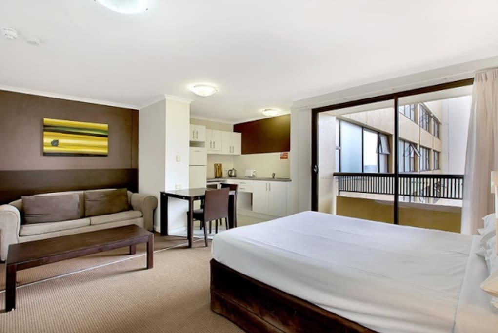 Fully self-contained kitchen. Balcony with out-door setting. Facing away from traffic noise.