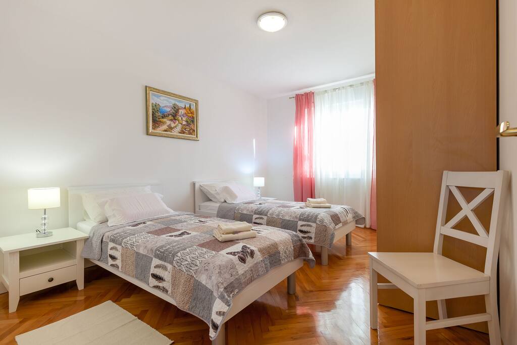 Room 1 with two separate beds
