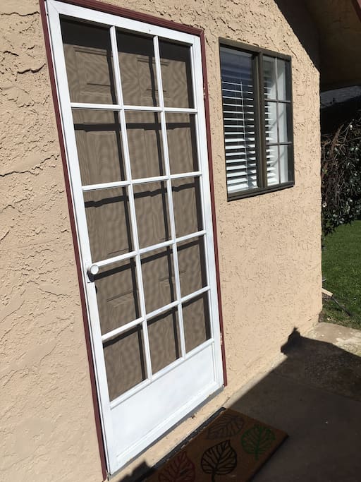 private entrance to guest house behind patio