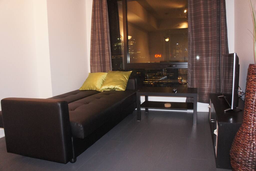 Sofa can be converted into a bed - extra blanket and pillow available