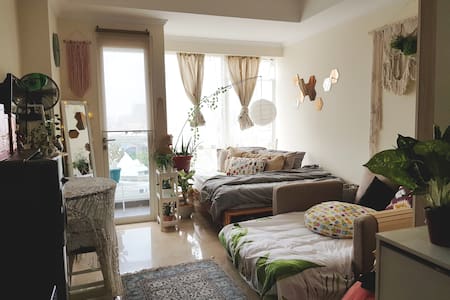 A bohemian-style NEW condo in very strategic area