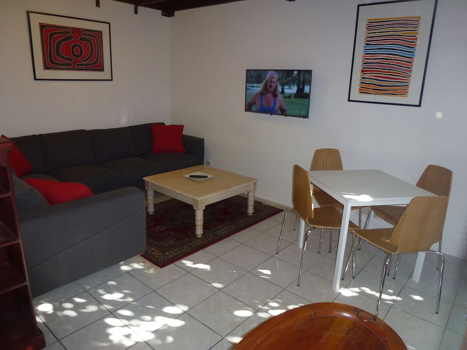 Sofa and Smart Tv on the wall