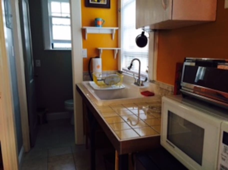 Kitchen with bathroom in back