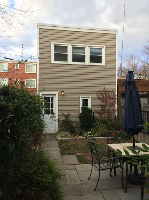Two-story carriage house with shared outdoor space