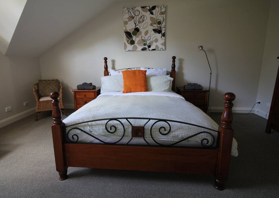 Spacious bedroom with queen size bed