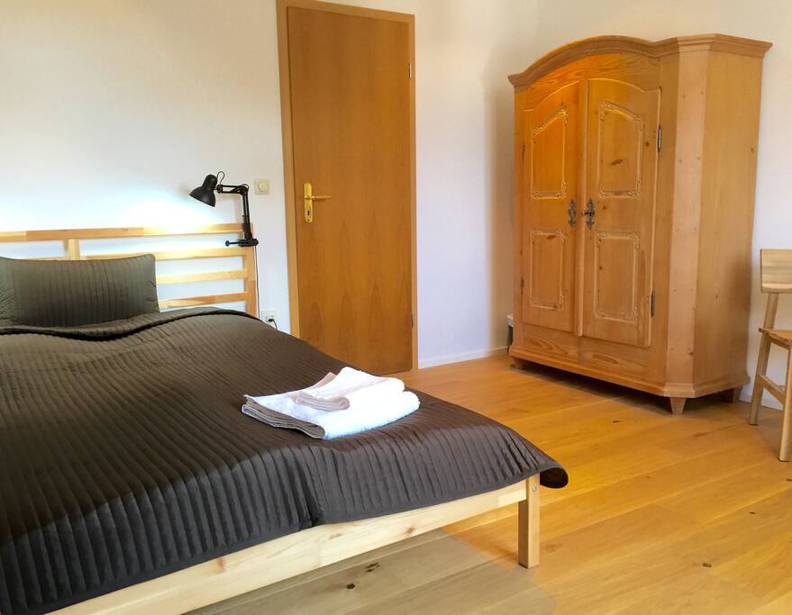 Bedroom, real wooden floor, no plastic laminate.