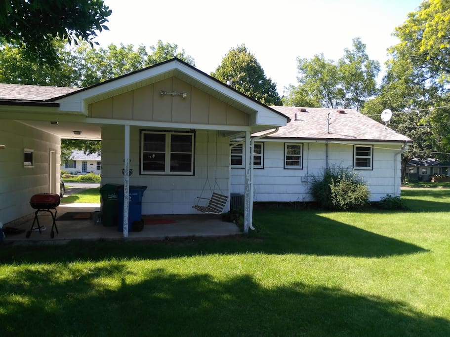 Covered porch area. Space in garage for one car.