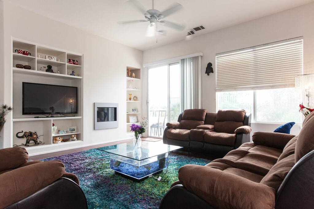 The living room also features a fire place and a TV for our guests to use