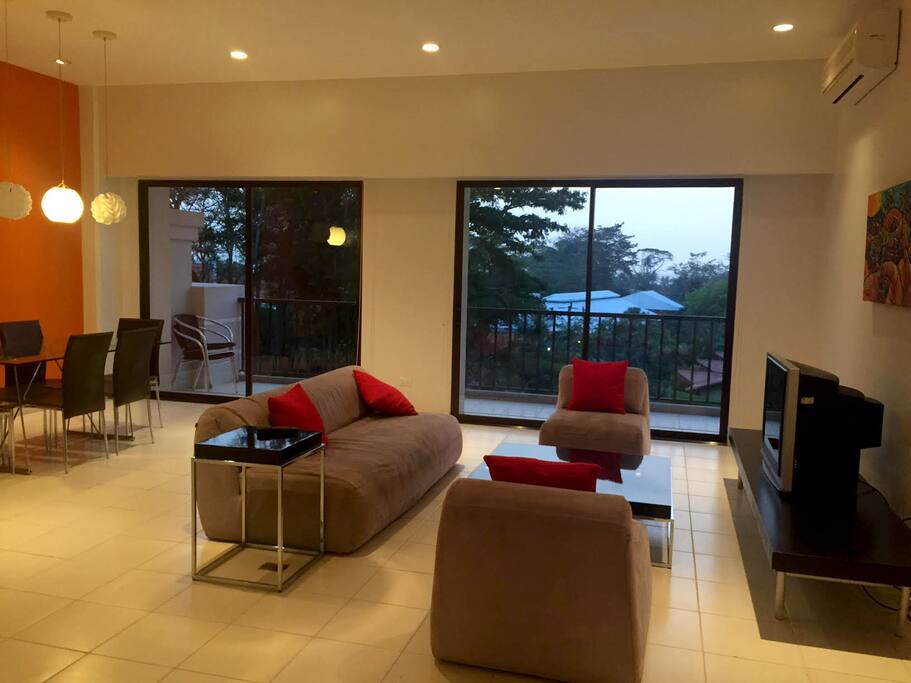 Dining and living rooms, with balcony and view