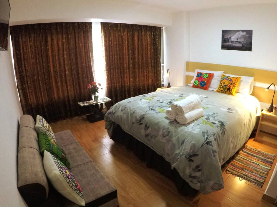 comfy room with private bath and tv