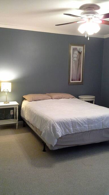 Private room with queen size bed and closet.