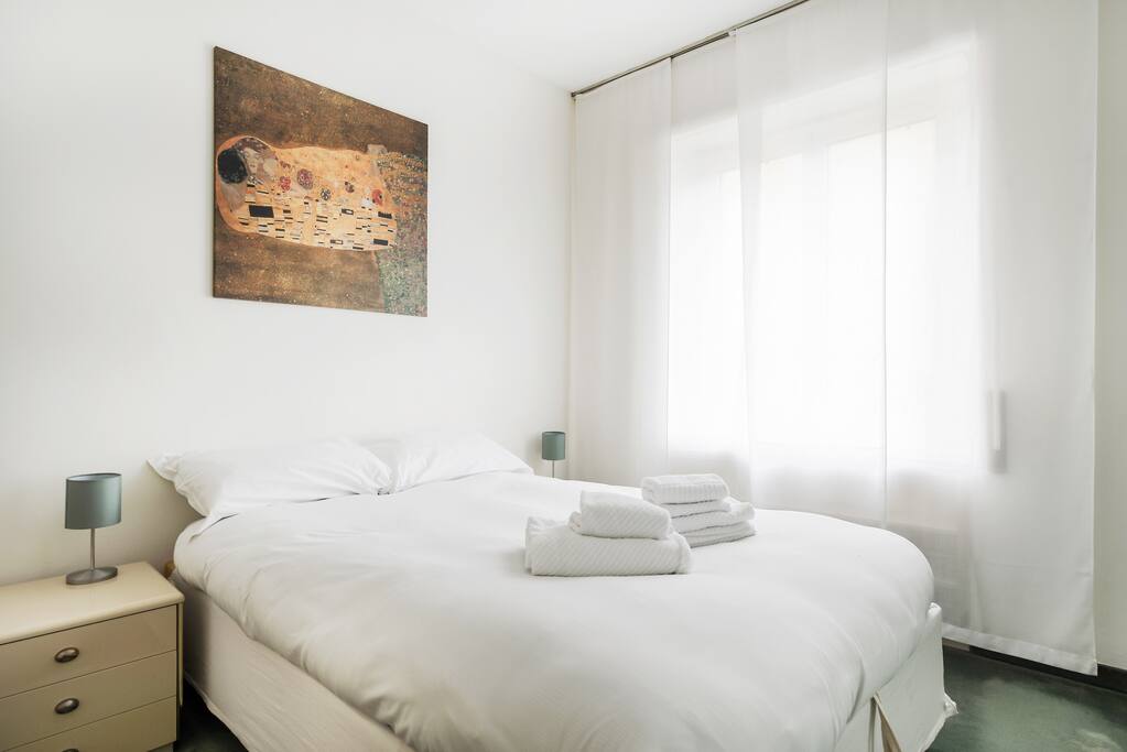 The Bedroom - The comfortable double bed with soft bed-linen and towels