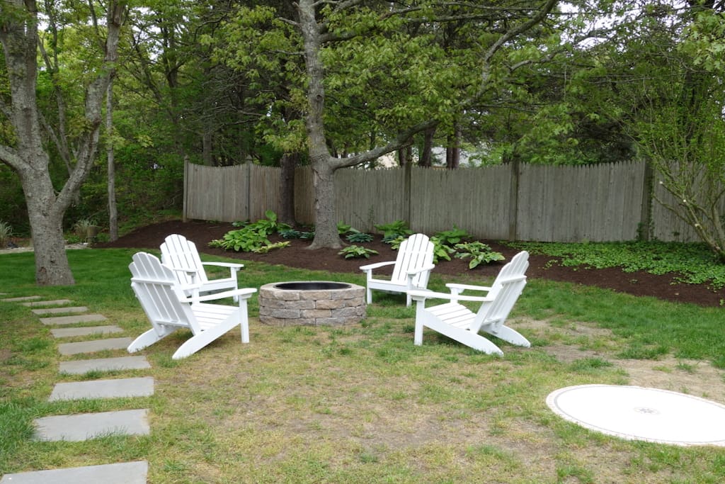 The fire pit and the Adirondack chairs in the back yard are guest favorites.