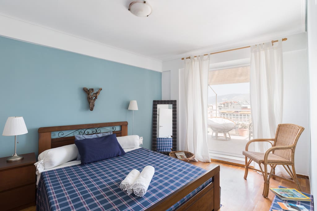 Main bedroom with access to furnished terrace..facing
east towards the mountains.