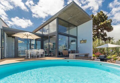 Architectural villa with private pool and sea view