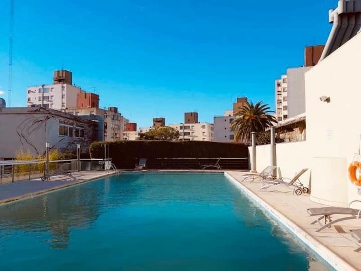 Studio apartment with pool and rooftop park in Colegiales