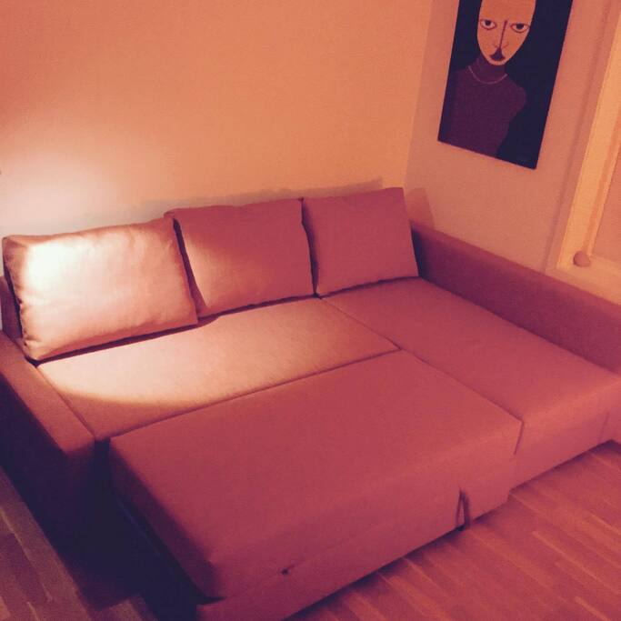 Storage room for duvets and blankets in the sofa