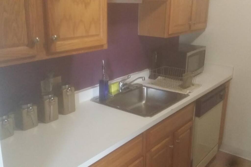 Kitchen, Fully stocked with utensils, pot / pans, dishwasher and microwave.
