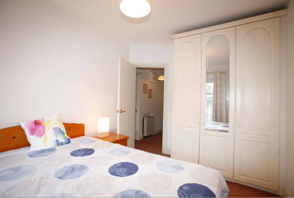 Roomy wardrobe space with extra bedding