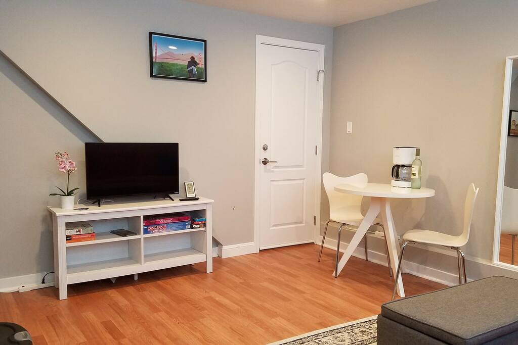 Living Room with a SMART TV (Netflix & Local Channels), and a Keurig coffee maker.