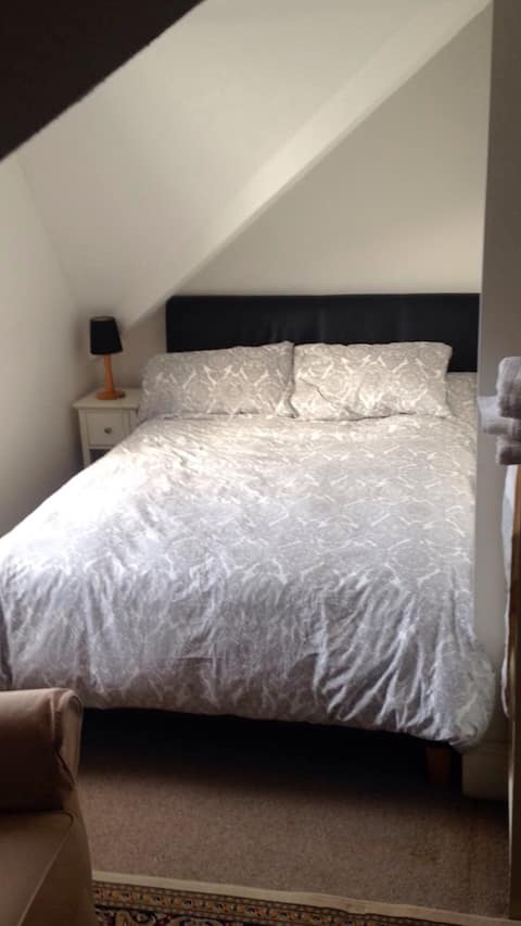 Double on-suite room in a city centre apartment.