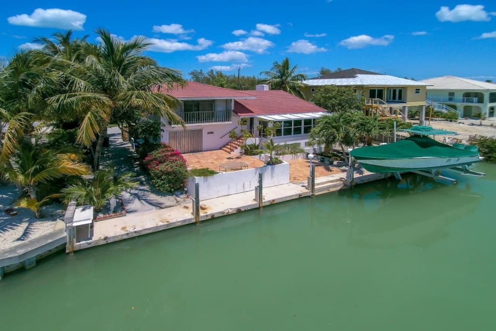Sits on 80 ft wide canal, with 70 ft dock. Plenty of room for your boat!